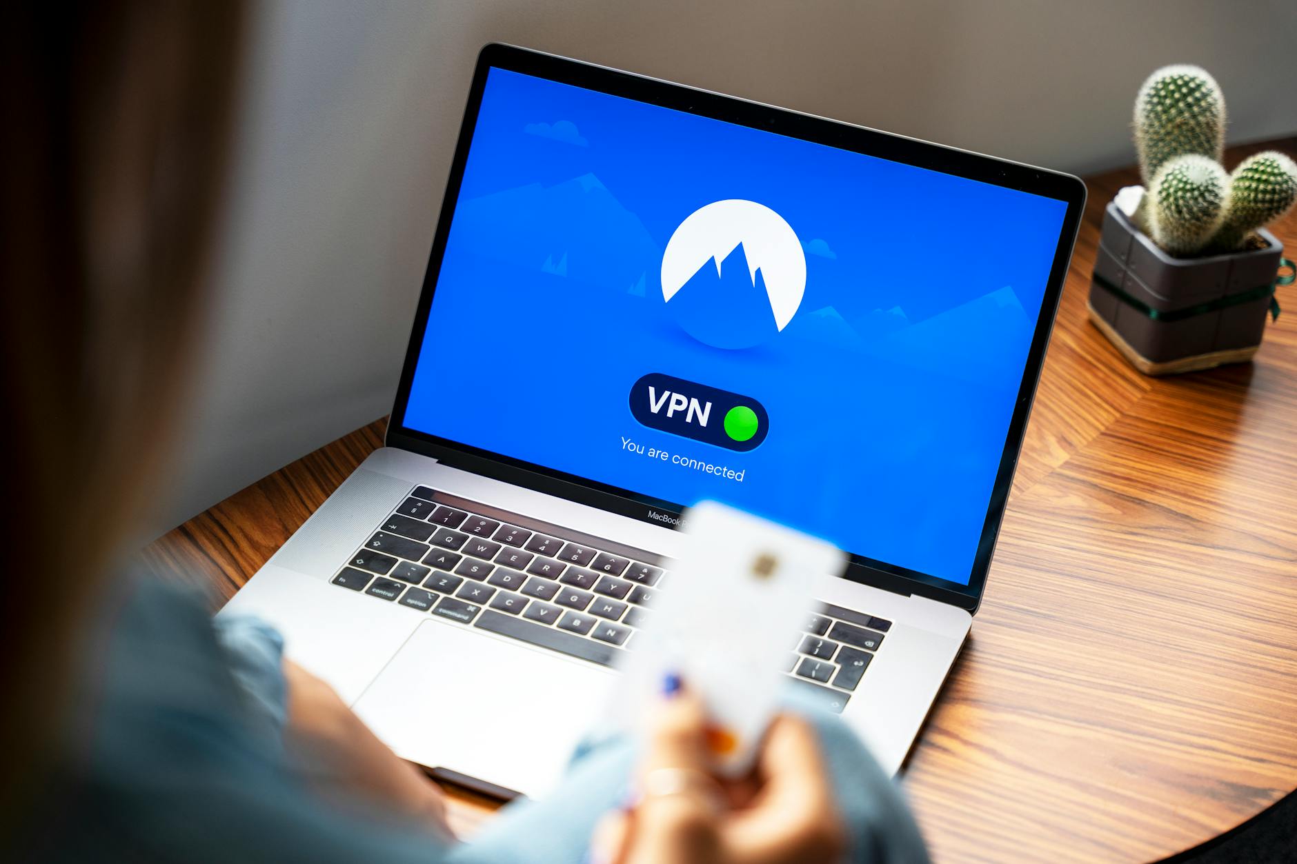 Laptop displaying a VPN interface, symbolizing secure private browsing for honest 2026 VPN rankings.