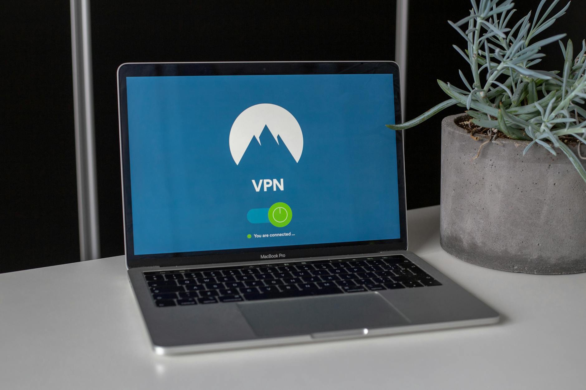 Laptop displaying a VPN interface, illustrating a comparison between Proton VPN and Mullvad in 2026.